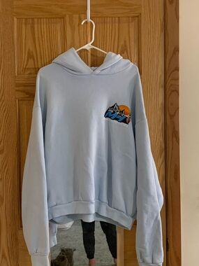 Madhappy Baby Blue Hooded Sweatshirt with Mountain Sunset Graphic